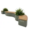 Caja de flores y asiento combinados de hierro forjado para oficinas de ventas de centros comerciales, banco paisajístico en forma de S, jardinera de ocio de acero galvanizado y madera plástica, hecho a medida
