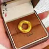 Venta al por mayor de Colgantes de Hebilla de Seguridad Mahjong Trenzados en Oro Antiguo de Alta Retención de Color Collares Retro Macizos de Tiendas de Oro