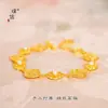 Tienda de oro con pulsera de loto auspicioso de perla de oro arena hebilla OT loto nueva pulsera china exquisita de lujo ligero para novia