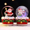 Nuevo producto transfronterizo: Regalo de Navidad - Bola de cristal de Navidad Estrella de los Deseos con nieve brillante y caja de música, adorno de escritorio