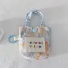 Bolsa para Auriculares Pequeña Fresca Floral Estilo Coreano Mini Diseño de Nicho Bolsa de Almacenamiento Anti-Caídas y Anti-Rozaduras Cubierta Protectora para Auriculares Bluetooth