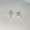 Pendientes de botón de cruz de circonita, estilo fresco y distante, para mujer, súper vendidos en Europa y América, sensación de alta gama, pendientes de aguja de plata, exquisita joyería nueva para orejas