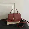 2026 Nova Bolsa Quadrada Pequena Simples da Moda Feminina de Ombro Único Transversal de Mão Bolsa Pequena Versátil de Alto Padrão para o Dia a Dia