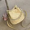 Bolsa de mão de moda transfronteiriça estilo coreano para mulheres, nova bolsa de balde com padrão de diamante 2026, bolsa de ombro única e crossbody fresca