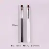 Pluma aplicadora de pegamento para decoración de uñas al por mayor transfronteriza, pluma de fototerapia de cabeza plana con cerdas de colores, pincel para decoración de uñas con mango individual negro y blanco