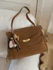 Bolso de Axila de Alta Gama de Gran Capacidad para Mujer Moda Retro Otoño e Invierno 2025 Bolso Tote Kelly para Viajar Bolso Cruzado