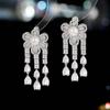 Pendientes de estilo retro exagerado de industria pesada de estilo europeo y americano, vestido de cena con pendientes largos de borlas con flores.