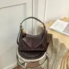 Bolso de axila para mujer, nueva colección primavera/verano 2026, simple y casual, bolso de hombro versátil, con un diseño sofisticado y retro, y gran capacidad