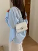 Bolso de cadena para mujer, versión coreana, nuevo de moda verano 2026, bolso cuadrado pequeño casual con personalidad, bolso cruzado de hombro simple de moda