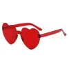 Gafas de sol con forma de corazón de colores de moda para mujer, sentido de alta gama 2024, dulce chica para salir a la calle, gafas de sol con protección UV, color caramelo