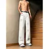 Jeans novo estilo americano para rua masculina, nova coleção 2026, apresentando um design único, corte solto, calça longa reta versátil para homens