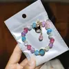 Libro Caperucita Roja Mismo Estilo Estudiante Pulsera de Glaseado de Palomitas de Maíz Hecha a Mano con Cuentas Dibujos Animados Cristal Pulsera Infantil Venta al por Mayor Cajas de Regalo