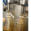 Máquina llenadora de líquido viscoso para detergente líquido, máquina llenadora de émbolo para fertilizante líquido de acero inoxidable, doble cabezal trabajando simultáneamente