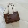 2026 Verano Nuevo Retro Textura Simple Moda Bolso Cubo Color Sólido Nicho Casual Alto Valor Bolso de Hombro Tendencia