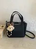Bolso Cubo Portátil Súper Popular para Mujer 2026 Nueva Moda Versátil Bolso de Hombro Cruzado Bolso de Mano de Alta Gama para Viajes Diarios