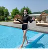 Novo maiô de duas peças com mangas compridas para mulheres, estilo conservador de estudante, roupa de banho que cobre a barriga, proteção solar, versão coreana [disponível para dropshipping]