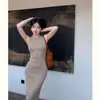 Chaleco Tejido sin Mangas Adelgazante con Rayas Verticales Texturizadas Verano Haze Coreano Vestido de Seda de Hielo Falda Bodycon OL