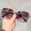2026 Nueva Tendencia de Moda Europea y Americana Gafas de Sol para Mujer, Sin Marco, Bordes Cortados, Efecto Adelgazante para Caras Grandes, Venta al por Mayor Transfronteriza