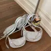 Bolso de Cadena Texturizado Transfronterizo para Mujer 2026 Nuevo Estilo Bolso de Hombro de Moda Versátil Elegante Bolso de Axila Tipo Dumpling Bolso Cruzado