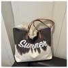 Bolsa Grande de Lona con Letra Difuminada para Mujer 2025 Ligera y Práctica Gran Capacidad Borla Color Contrastante Estilo Extranjero Bolso de Hombro Tote