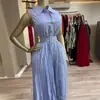 Ropa de Mujer Transfronteriza Europea y Americana Moda Nueva Verano 2026 Vestido Simple de Solapa sin Mangas con Corbata Plisado Rayado para Mujer