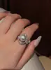 Anel planeta giratório para mulheres, com pérola Shijia redonda banhada a cobre com ouro real, cheio de diamantes, elegante e único com um senso de mistério