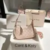 Dropshipping Bolso de Axila Rosa de Luna Creciente de Nicho de Gama Alta 2025 Nuevo Bolso Versátil tipo Baguette para Hombro al por Mayor