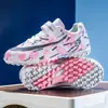 Zapatos de fútbol para niños transfronterizos, zapatos de entrenamiento deportivo para exteriores, zapatos de fútbol para hombres para estudiantes de primaria y secundaria, zapatos de tacos para mujeres al por mayor
