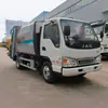Caminhão compactador de lixo Fangjiang 5.8, apresentando uma estrutura de aço de alta resistência, um tanque de esgoto e projetado para o transporte selado de resíduos municipais e residenciais.