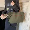 Bolso de mano sencillo estilo japonés para estudiantes universitarias, adecuado para ir a clase, un bolso cruzado ligero y versátil, también se puede llevar como bolso de mano o bolso de hombro
