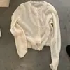Vestido Regata Camisola de Cor Sólida Estilo Francês Gentil Elegante Emagrecedor Camadas de Babados Cardigan Fino Feminino Coleção Primavera/Verão 2026