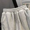 Pantalones cortos deportivos versátiles de estilo coreano con cordón para el día a día, unisex, casual, modernos, de corte holgado, adelgazantes, pantalones versátiles hasta la rodilla