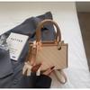 Bolsa de Mão Feminina Nova Verão 2025 Estilo Coreano Simples Moda Pequena Quadrada Bolsa de Ombro Transversal Tendência para o Trabalho