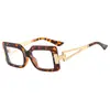 Gafas de ordenador de moda moderna transfronterizas europeas y americanas, caja retro, gafas anti luz azul, montura de gafas ópticas hueca de metal