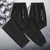 [Fábrica en stock] Pantalones de seda de hielo para hombre, talla grande, rectos, casuales, de verano, finos, de nailon.