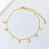 [acero de titanio de cuerpo completo] nueva moda serie de tobilleras de acero de titanio corazón de melocotón luna no se desvanece doble borla joyería para el pie