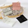 Stock Listo de Fábrica Bolsa de Terciopelo de Microfibra Transfronteriza Conveniente para Viajes Almacenamiento Bolsa a Prueba de Polvo Bolsa para Guardar Anillos Collares Pulseras