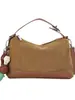Elegante y chic bolso de mano tipo dumpling para mujer, nuevo modelo otoño e invierno 2026, patchwork de estampado de leopardo de lujo ligero para uso diario, bolso de hombro y cruzado
