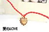 Tienda de 2 yuanes pulsera de cuerda roja de pescado anual al por mayor pulsera de pareja lote de regalo pequeño
