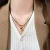 Collar de doble capa de ojo de tigre estrella para mujer, estilo bohemio de nicho, exquisita cadena para la clavícula, nuevo 2024, cadena para sudadera