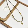 Collar transfronterizo estilo Melard de ojo de tigre y acero de titanio, vintage, nicho, alta gama, cadena de clavícula con cuentas, cadena versátil para suéter