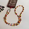 Cadena de Colgar para Teléfono Móvil de Color Caramelo Dopamina Corazón Arcoíris Hecha a Mano con Cuentas Correa Cruzada Anticaída Correa para Cámara Ccd