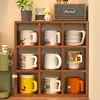 Portavasos de nueve compartimentos, organizador para tazas y tazas de té, estante de almacenamiento multicapa simple, soporte de exhibición para figuras y adornos, estante de exhibición multifuncional
