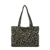 Bolso de mano de gran capacidad con diseño de nicho estampado de leopardo para mujer, nuevo bolso de hombro otoño e invierno 2024, bolso tote coreano de dibujos animados