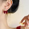 Hermosos pendientes de lazo rojo de perla para mujer, con clip para la oreja en espiral antimosquitos, pendientes sin orejas, modernos y elegantes para otoño e invierno.
