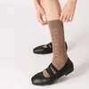 Calcetines de Mujer Estilo Pasarela Nueva Primavera/Verano 2026 con Diseño Hueco, Calcetines Transpirables de Media Pantorrilla, Versátiles y de Moda Estilo Miu