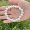 Pulsera de perlas artificiales para mujer diaria, pulsera de cuerda elástica de 4MM-14MM, joyería simple de perlas de imitación coreanas