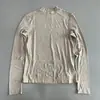 Estilo suave y casual, cuello semi-alto, manga larga, camiseta transpirable nueva de otoño para mujer, top base versátil que estiliza, top de color liso