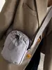 2025 Nuevo Estilo Japonés Otoño Bolsa para Teléfono con Cordón Simple Moda Viajero Exterior Casual Cruzada Bolso para Mujer
