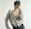 Outono/Inverno 2026 Novo Conjunto de Tricô de Duas Peças para Mulheres: Cardigan Curto de Tricô com Decote V Suave + Regata - Estilo Coreano Transfronteiriço
